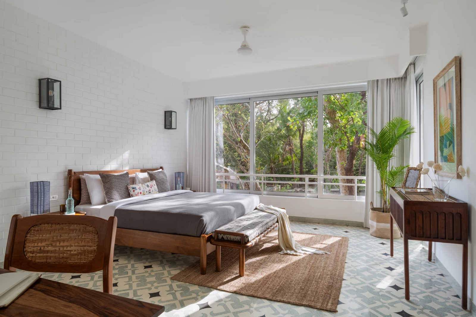 Modern terrazzo tiled bedroom at La Soria villa in Assagao