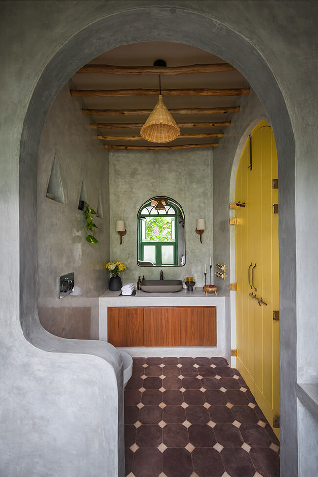 Yellow themed bathroom at La Gemela